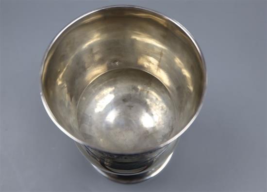 A late George III silver presentation goblet, London, 1817, marks very rubbed, decorated with vineous band and ram, 14.7cm,